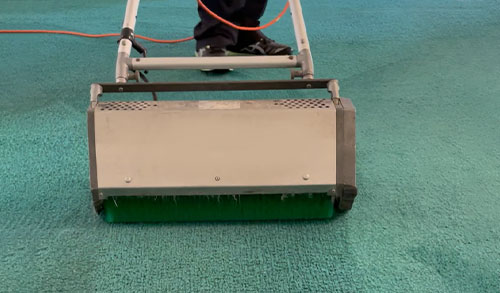 Scrub phase of the Chandler carpet cleaner 5 step process